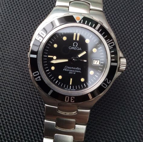 omega seamaster 1991|Omega Seamaster gold bezel.